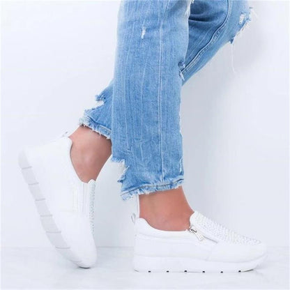 White Women Crystal Casual Slip-On Sneakers by Stevvex with zipper accent and chunky white sole on Tampa Home & Garden Store