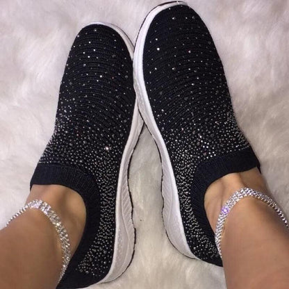 Pair of black crystal-embellished slip-on sneakers with white sole on Tampa Home & Garden Store