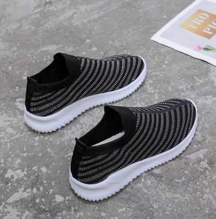 Stevvex White Women Crystal slip-on sneakers, knit upper with crystal accents, outsole on Tampa Home & Garden Store