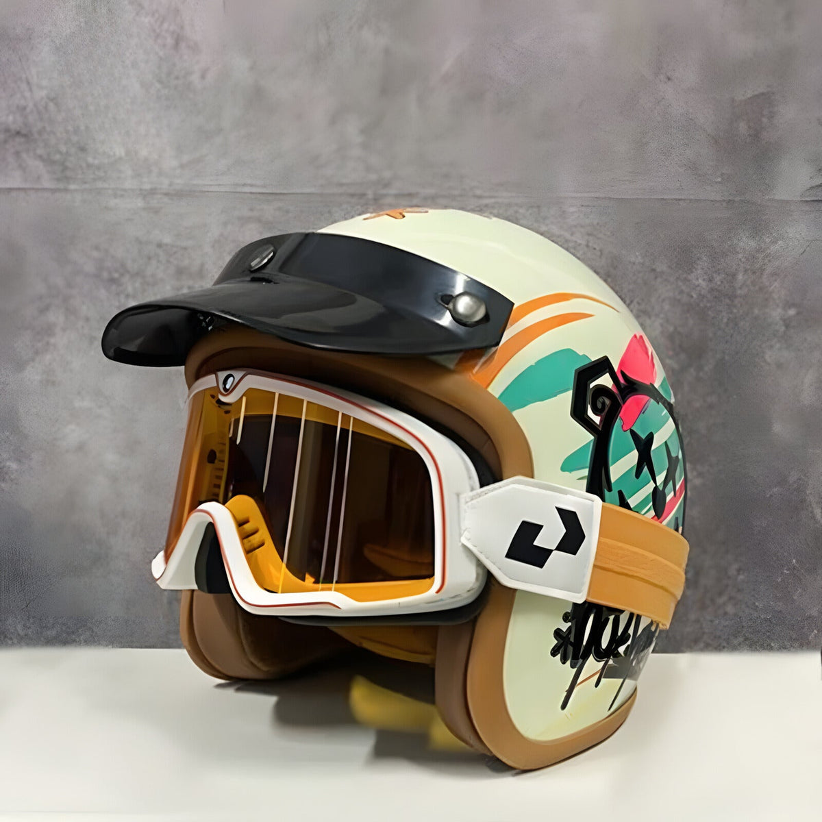 NOSPEAK retro open-face helmet by BikerZoneZ with cream and orange graphics plus goggles on Tampa Home & Garden Store