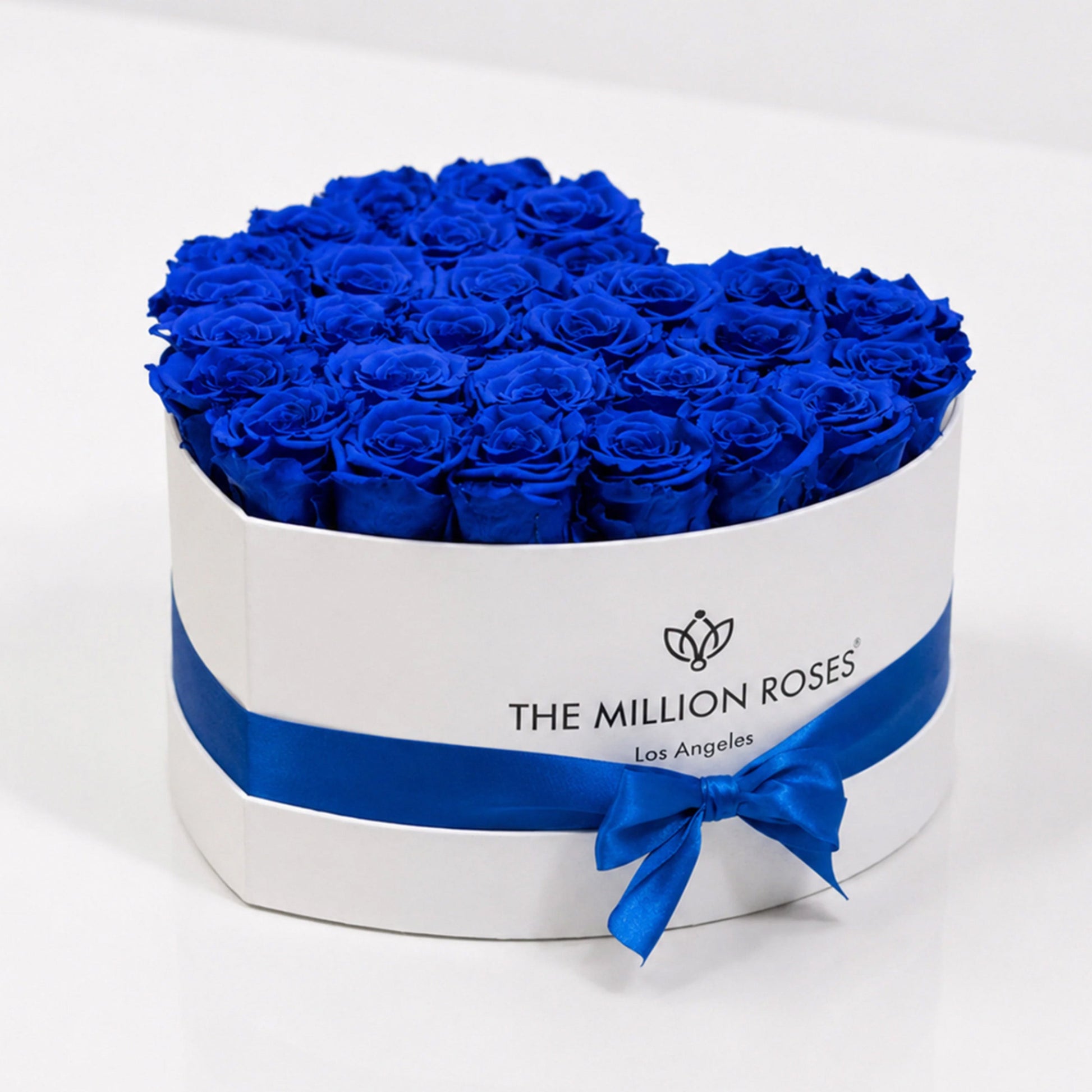 Blue eternity roses in a heart white box by The Million Roses, royal blue bouquet on Tampa Home & Garden Store
