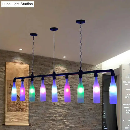 Modern seven-light wine bottle island pendant with colorful glass shades over kitchen island on Tampa Home & Garden Store