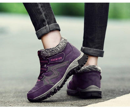 Winter fur-lined purple leather boots by Stevvex with rugged rubber sole for unisex wear on Tampa Home & Garden Store