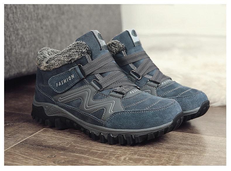Pair of Winter unisex Stevvex navy leather boots with faux fur lining and rugged lug soles on Tampa Home & Garden Store
