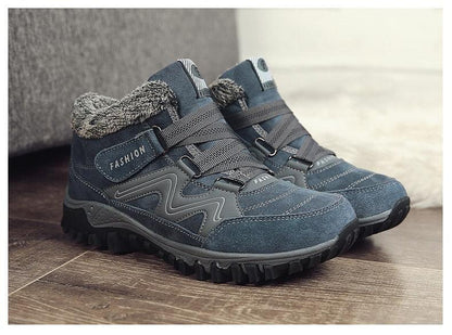 Pair of Winter unisex Stevvex navy leather boots with faux fur lining and rugged lug soles on Tampa Home & Garden Store