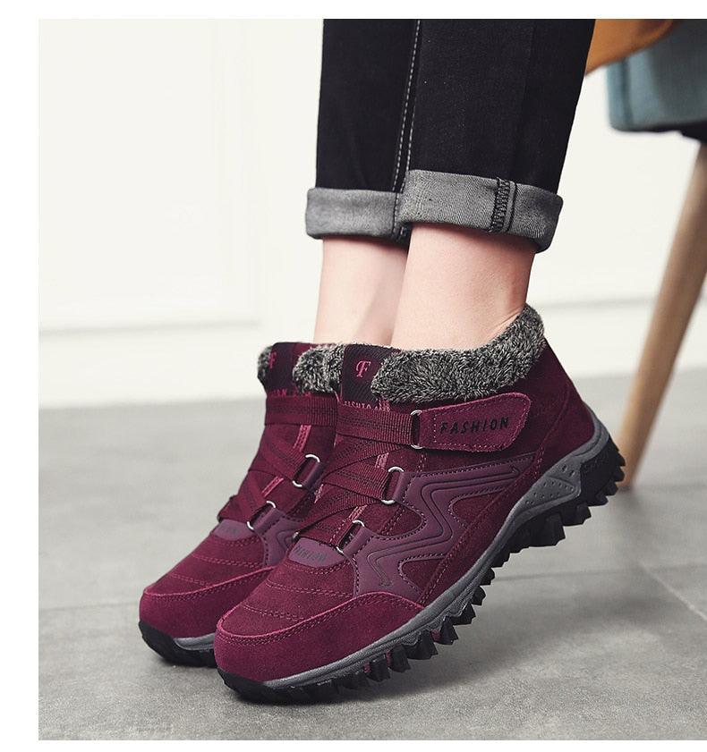 Stevvex burgundy fur-lined high-top winter boots with rugged non-slip sole for snow, pair on Tampa Home & Garden Store