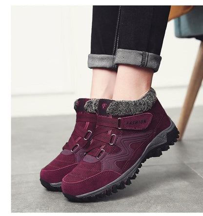 Stevvex burgundy fur-lined high-top winter boots with rugged non-slip sole for snow, pair on Tampa Home & Garden Store