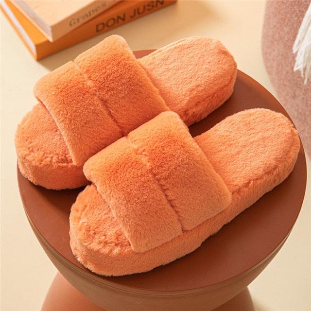 Women's peach plush fur slippers with open toes and thick soles pair on Tampa Home & Garden Store