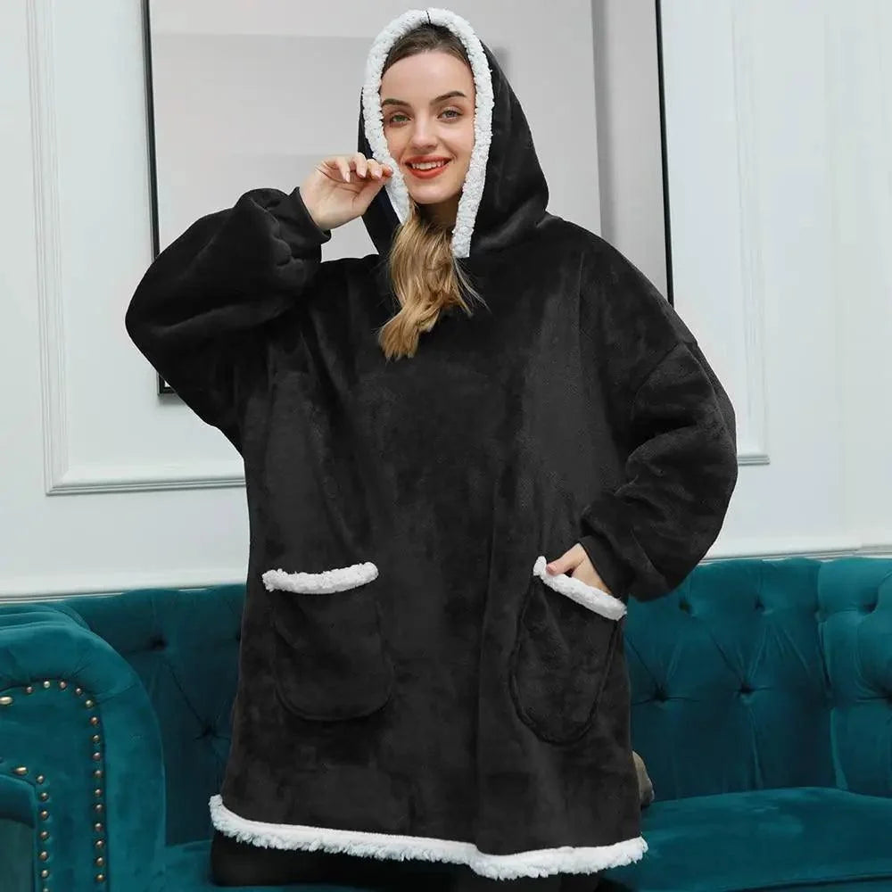 Stevvex black oversized wearable blanket hoodie with white faux shearling trim and pockets on Tampa Home & Garden Store