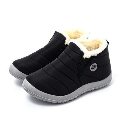 Winter waterproof black quilted ankle boots with cream fur lining, gray sole, BN logo patch on Tampa Home & Garden Store
