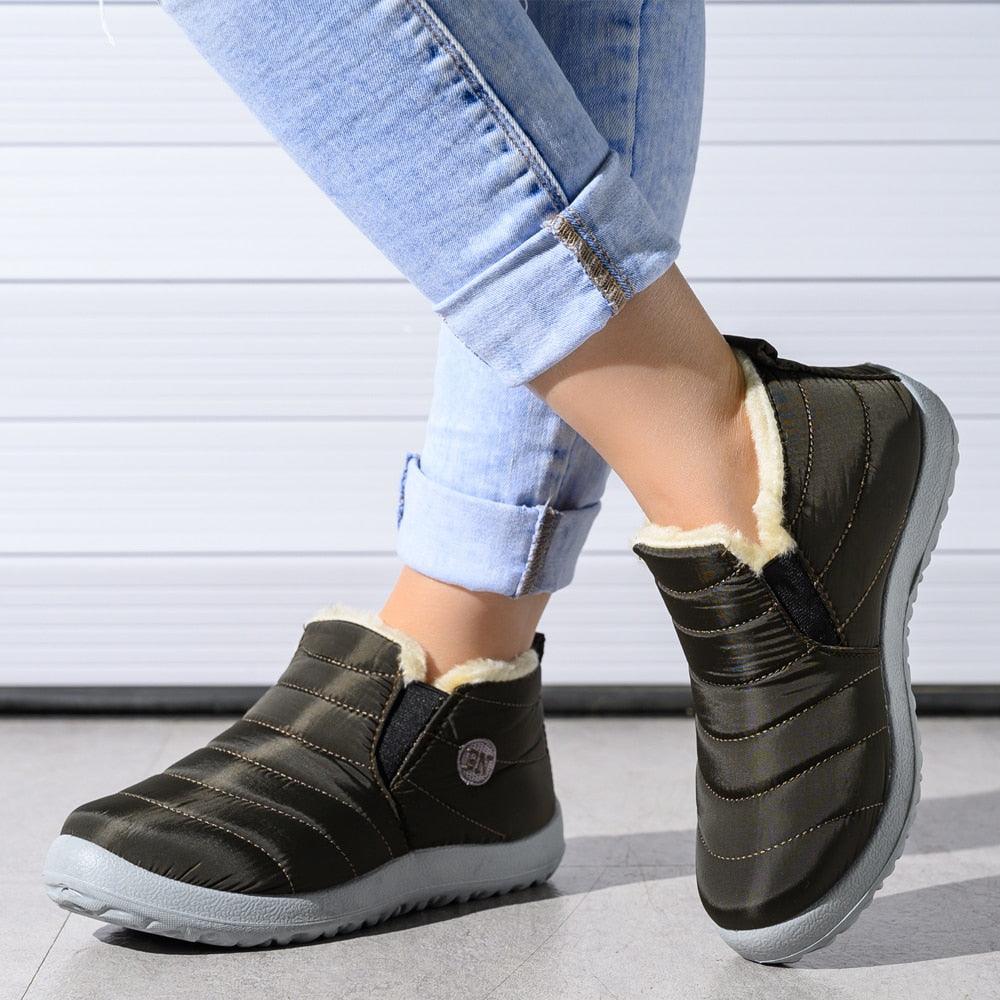 Stevvex black waterproof winter boots with faux fur lining and quilted panels, slipon ankle style on Tampa Home & Garden Store