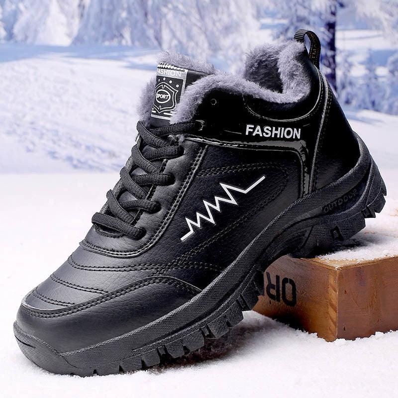 Black leather winter boot with plush grey lining, lace-up front, ankle-height, rugged outsole on Tampa Home & Garden Store