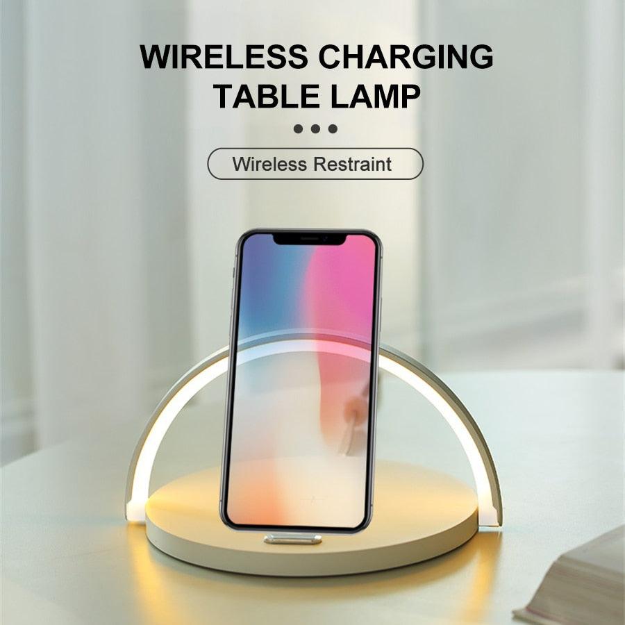 Stevvex wireless charging desk lamp with LED arc light and phone stand on beige base on Tampa Home & Garden Store