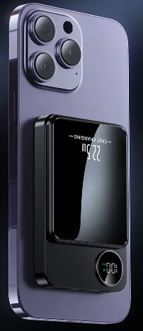 Magnetic Wireless Power Bank by River Country Gear on back of purple phone, black charger on Tampa Home & Garden Store