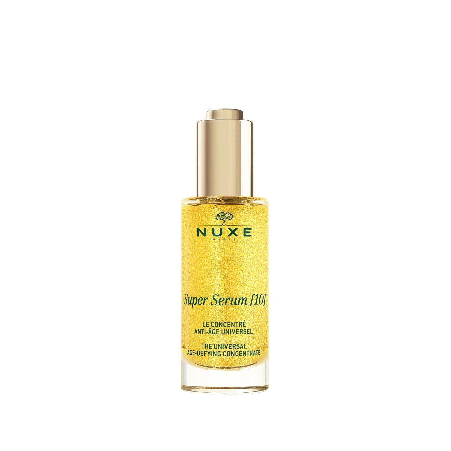 Nuxe Super Serum 10 face serum bottle with gold cap and shimmering yellow serum on Tampa Home & Garden Store