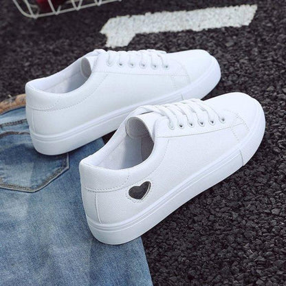 Stevvex white PU leather sneakers pair with heart cutout and platform sole on Tampa Home & Garden Store