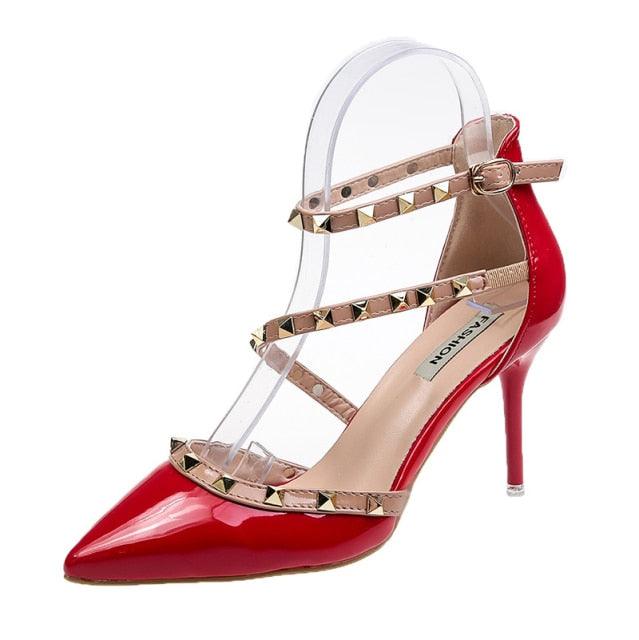 Red pointed-toe stiletto sandal by Stevvex with clear PVC straps and beige studded bands on Tampa Home & Garden Store