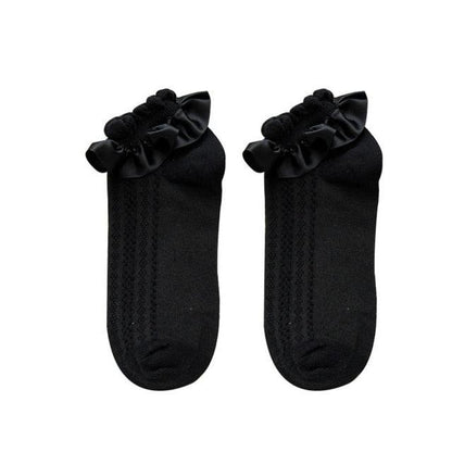 Pair of black ruffle-top short socks with bow accents for cosplay Stevvex crew socks on Tampa Home & Garden Store