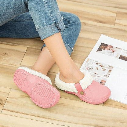 Women pink fur-lined Stevvex slippers, plush waterproof indoor clogs for home use on Tampa Home & Garden Store