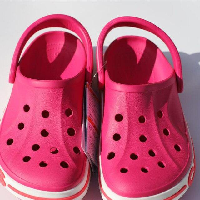 Lightweight Stevvex beach clogs slides pink perforated rubber back strap pair on Tampa Home & Garden Store