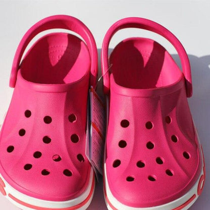 Lightweight Stevvex beach clogs slides pink perforated rubber back strap pair on Tampa Home & Garden Store