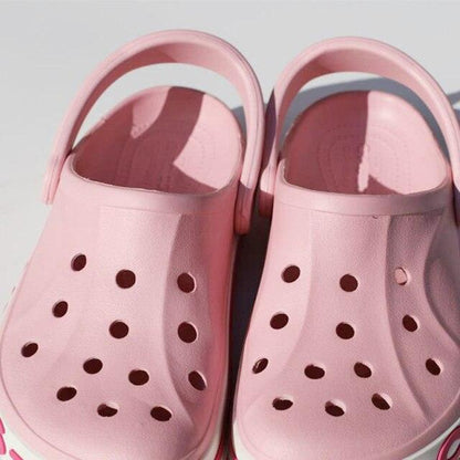 Lightweight Stevvex pink beach clogs for women and men with ventilation holes on Tampa Home & Garden Store