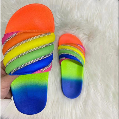 Stevvex women's rainbow slide sandals with rhinestone straps, neon color bands and gradient sole pair on Tampa Home & Garden Store