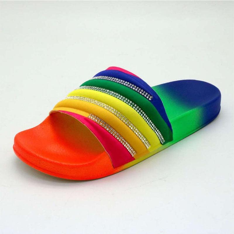 Stevvex rainbow rubber slide sandal with colorful striped straps and rhinestone bands on upper on Tampa Home & Garden Store