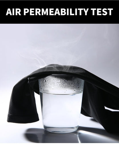 Fabric air-permeability test setup with black cloth draped over a glass of water on Tampa Home & Garden Store