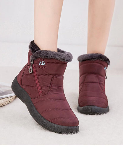 Stevvex burgundy waterproof snow boots for women, ankle, zipper detail, cushioned sole, pair on Tampa Home & Garden Store