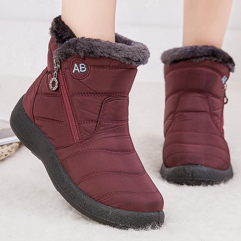 Stevvex burgundy waterproof snow boots with faux fur lining and side zipper on Tampa Home & Garden Store