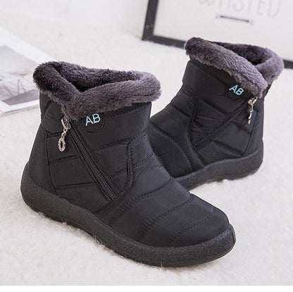 Women’s waterproof winter boots by Stevvex with fur trim, black quilted upper, side AB logo on Tampa Home & Garden Store