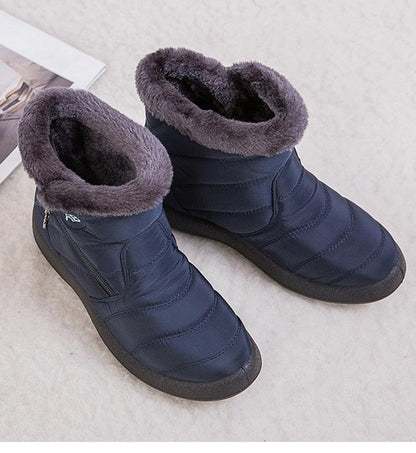 Stevvex women's navy blue waterproof snow boots with fur lining, side zipper, ankle height on Tampa Home & Garden Store