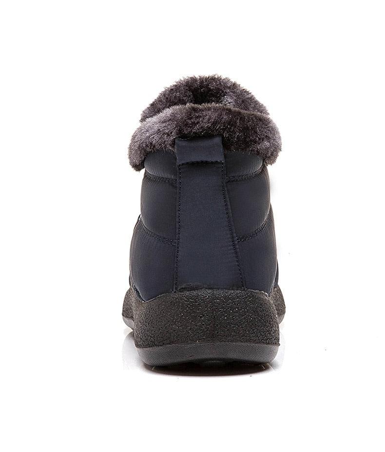 Stevvex women's navy blue waterproof snow boot with plush fur lining, ankle height, slip-on comfort on Tampa Home & Garden Store
