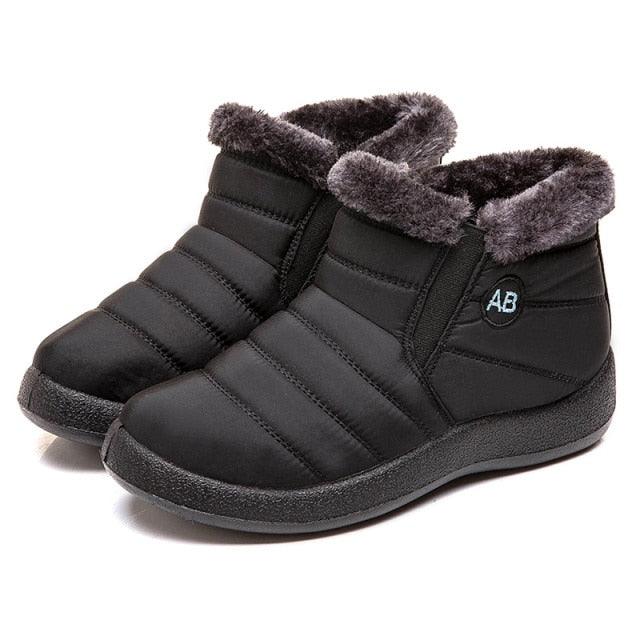 Women's Stevvex waterproof fur-lined snow boots, black quilted ankle slip-on pair on Tampa Home & Garden Store