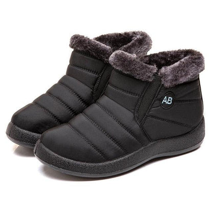 Women's Stevvex waterproof fur-lined snow boots, black quilted ankle slip-on pair on Tampa Home & Garden Store