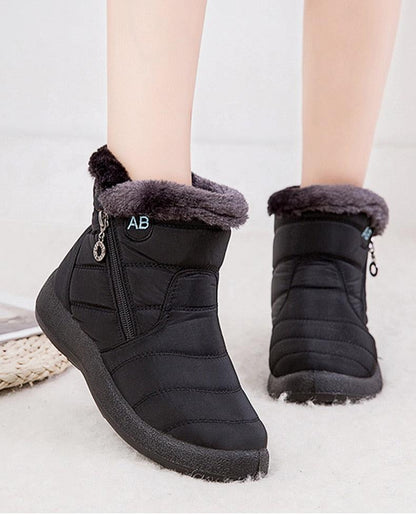 Stevvex Women's waterproof winter boots with faux fur lining, ankle height, side zip on Tampa Home & Garden Store