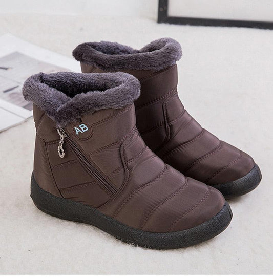 Stevvex women's brown waterproof snow boots with fur lining and side zipper, warm ankle boots, pair on Tampa Home & Garden Store