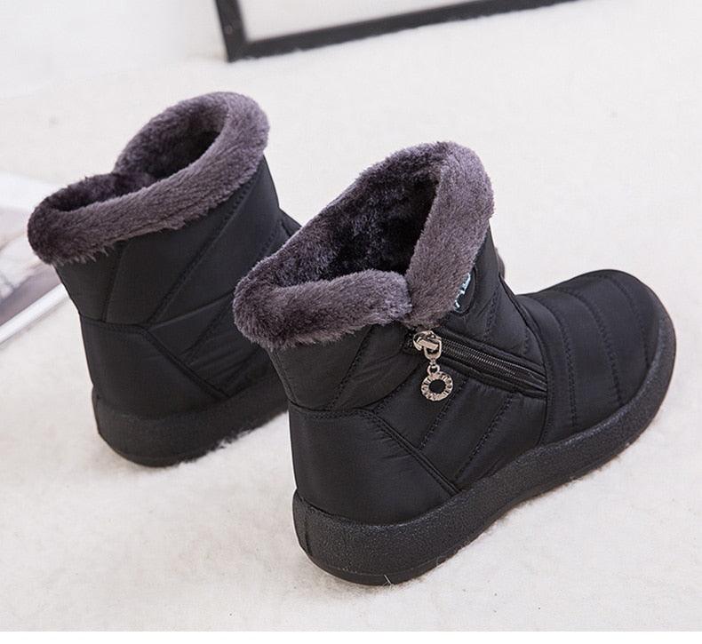Women Stevvex waterproof snow boots, black ankle boots with gray faux fur lining and side zip on Tampa Home & Garden Store