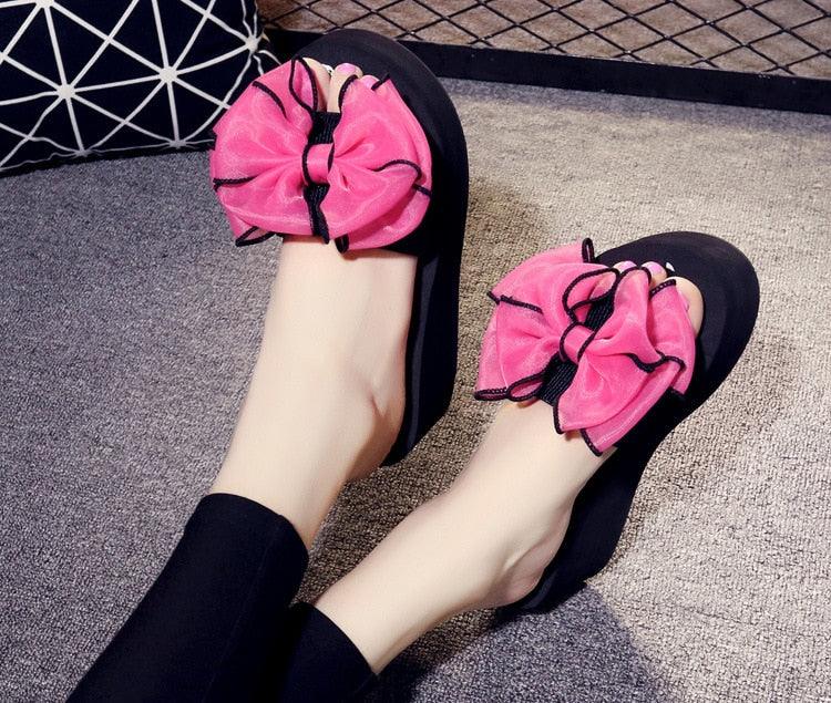Stevvex Women bow summer sandals with pink knotted bows on black open-toe slides on Tampa Home & Garden Store