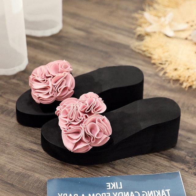 Women platform sandals pair with pink rosettes on black foam soles, indoor outdoor wear on Tampa Home & Garden Store