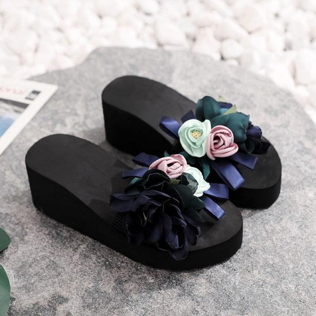 Women bow platform sandals by Stevvex with black sole and fabric flower decorations on Tampa Home & Garden Store