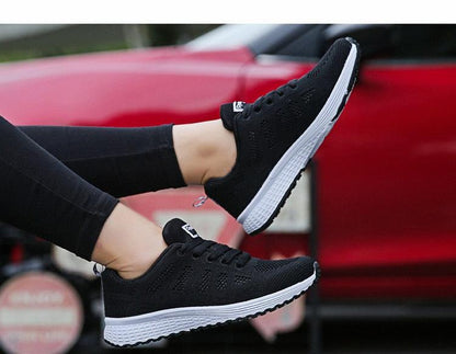 Pair of Women’s Stevvex black breathable mesh sneakers with white sole on Tampa Home & Garden Store