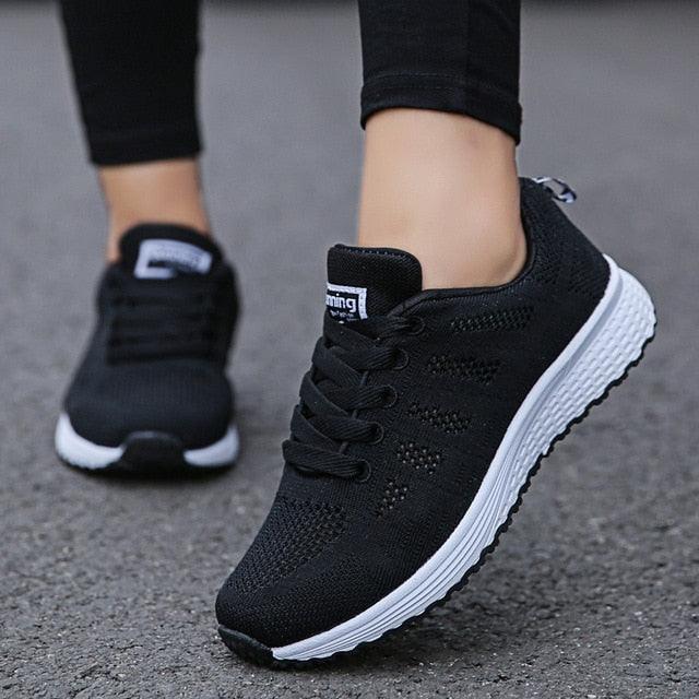Stevvex women's black mesh sneakers pair with white sole, breathable walking shoes on Tampa Home & Garden Store