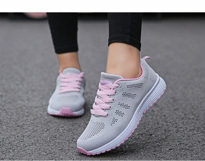 Stevvex Women casual breathable mesh sneakers gray upper with pink laces, pair on Tampa Home & Garden Store