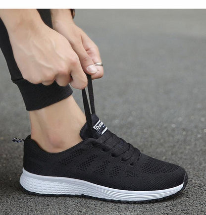 Stevvex women's mesh sneakers, black knit upper with white sole, breathable walking shoes on Tampa Home & Garden Store