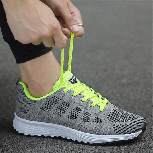 Stevvex women's mesh sneakers, gray breathable walking shoes with neon lime laces on Tampa Home & Garden Store