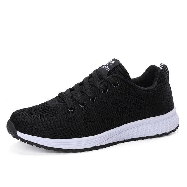 Stevvex women's breathable mesh lace-up sneakers, black knit upper with white sole on Tampa Home & Garden Store
