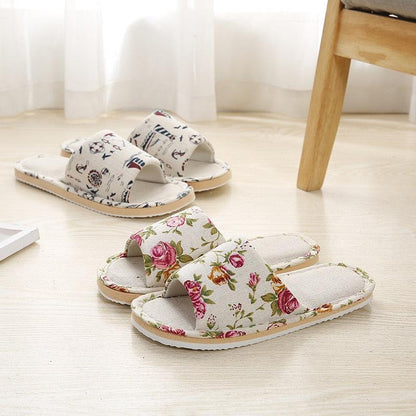 Women floral cloth indoor slippers with open toe and two wide straps; 2 pairs shown on Tampa Home & Garden Store