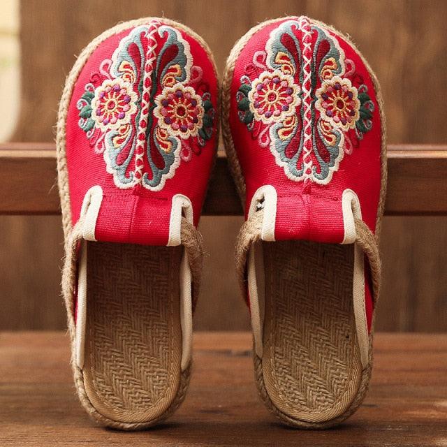 Women’s red embroidered linen slippers pair with floral motif and jute espadrille sole on Tampa Home & Garden Store